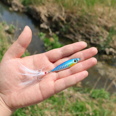 Lure shapes designed to wobble and flash in water