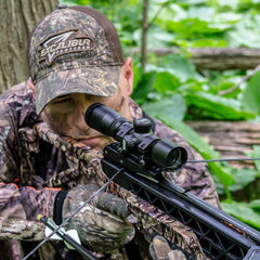Excalibur Dead Zone scope with chevron reticle aids estimating distances from 20 to 60 yards.