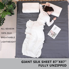 Exermil silk travel sheet shown with compact nylon carrying bag