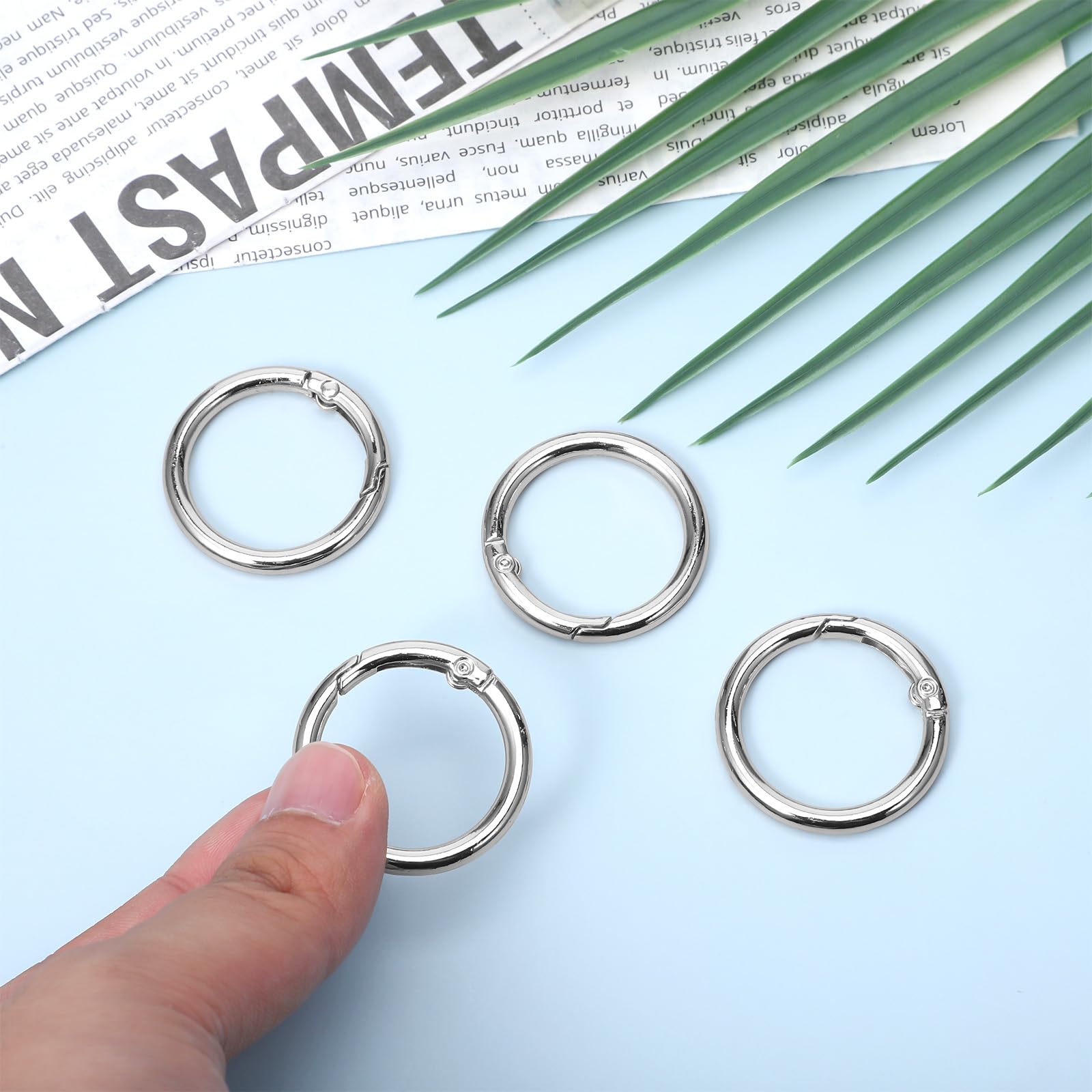 Exircy round carabiner spring mechanism close-up shows secure opening