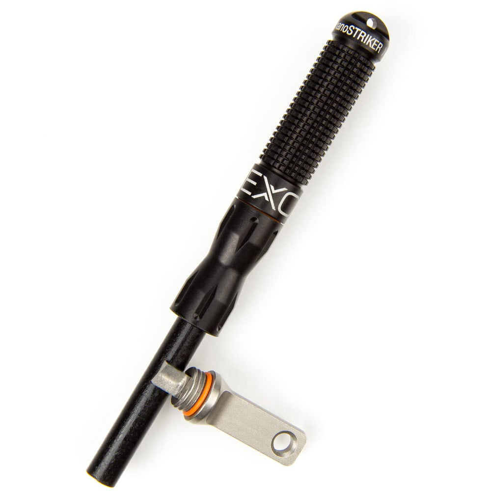 Exotac nanoSTRIKER XL fire starter packaged for easy carry and quick campfire setup.