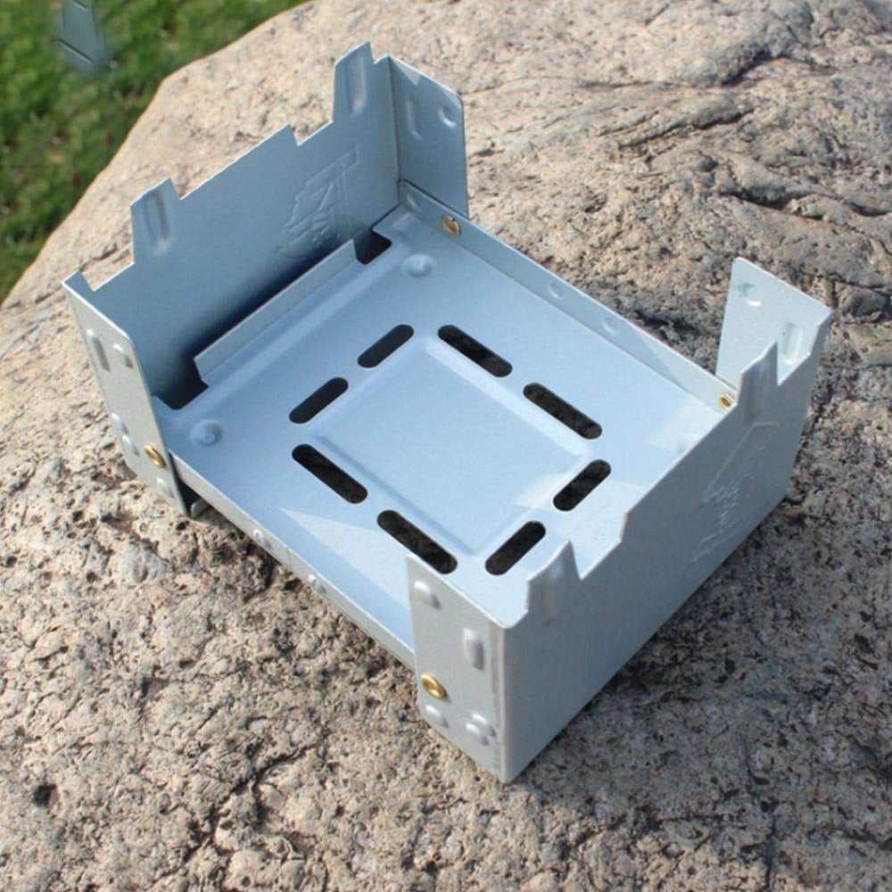 Fafeims travel stove opened to reveal palm-sized cooking area