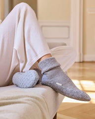 FALKE Cosyshoe silicone grip soles reduce slipping on smooth floors.
