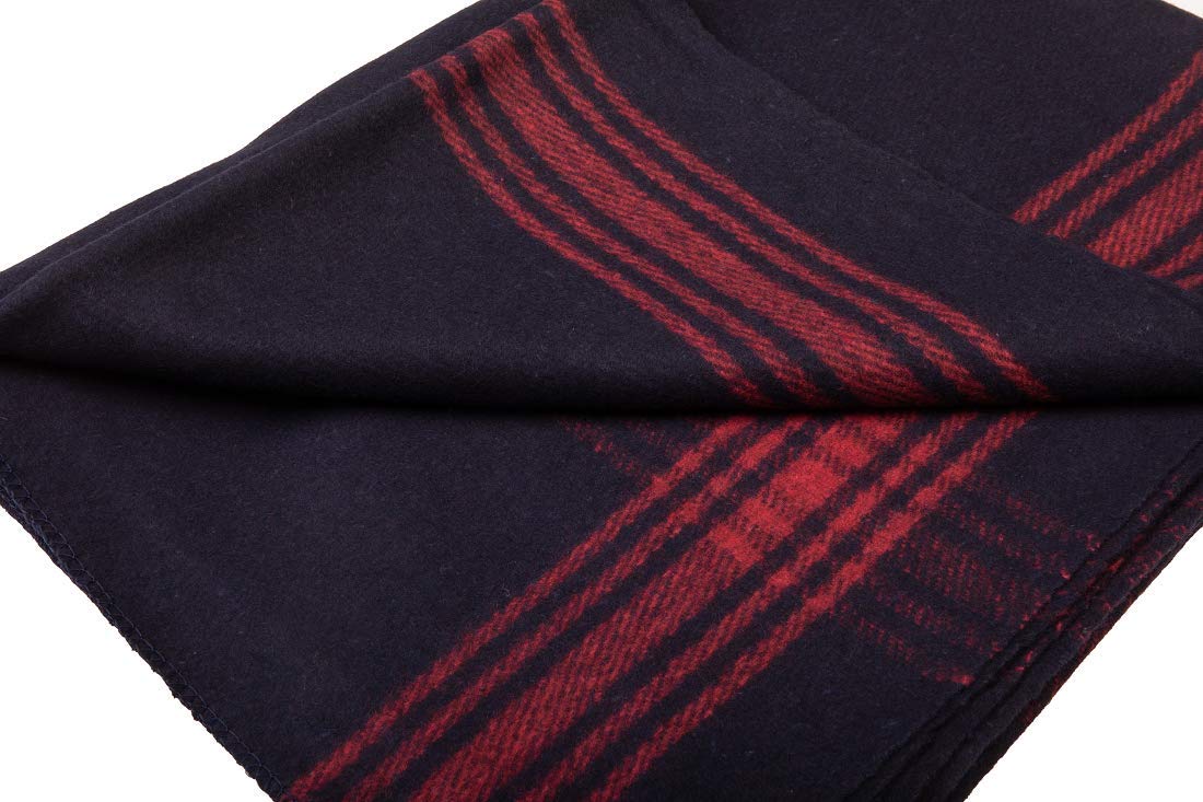 Farm Blue Wool Blanket navy stripes in backpack, lightweight warmth for hikes.