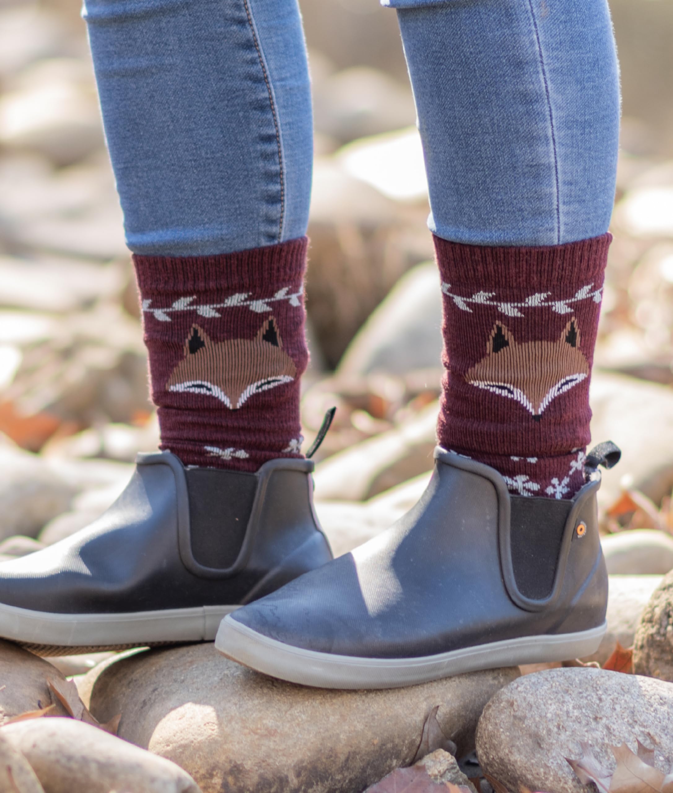 Person wearing plum Emeryville socks during daily errands.