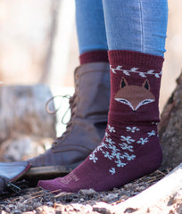 Emeryville plum color close-up showing lightweight merino knit.