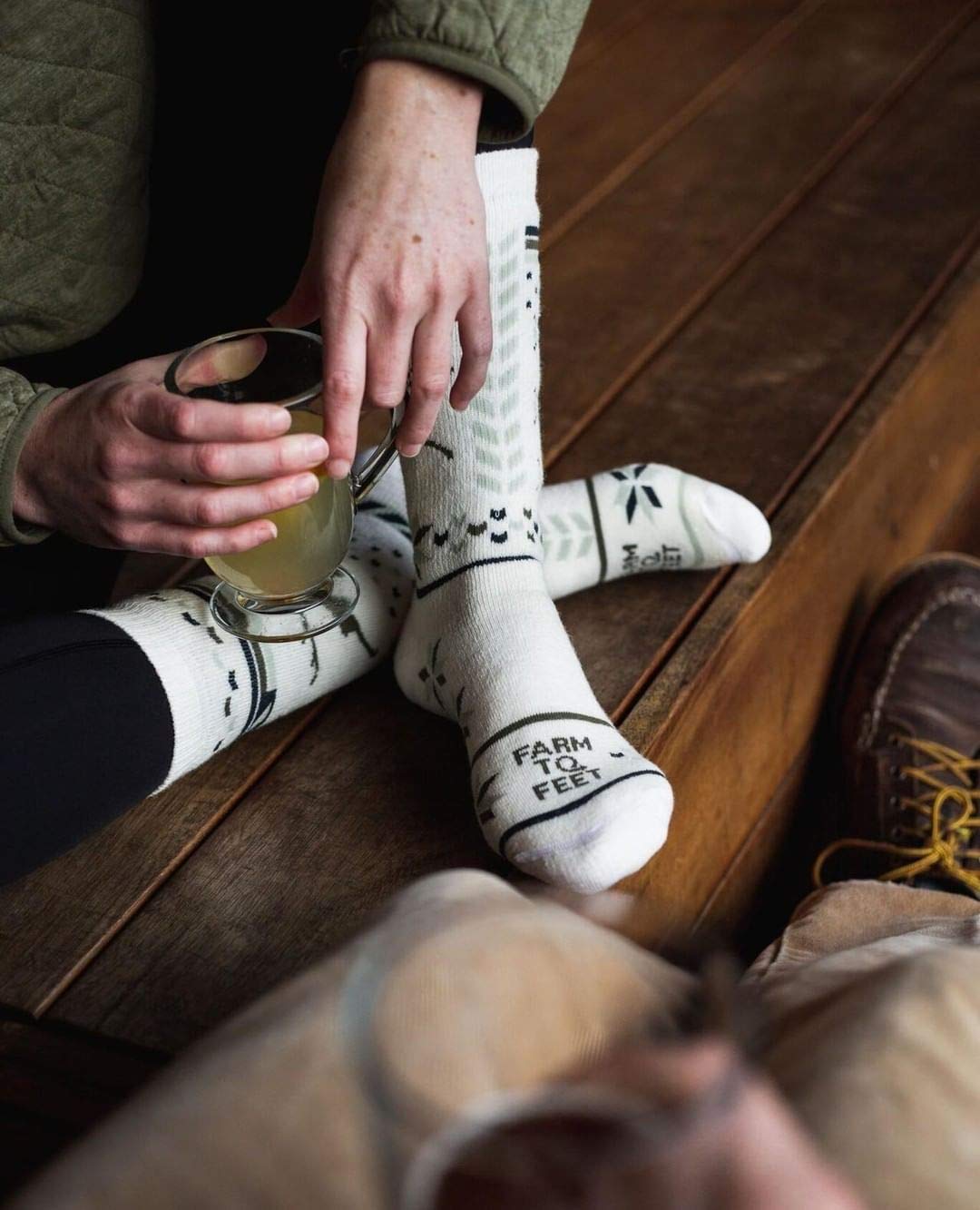 Farm to Feet Hamilton Green Gables sock packaging view emphasizes quality and American merino sourcing.