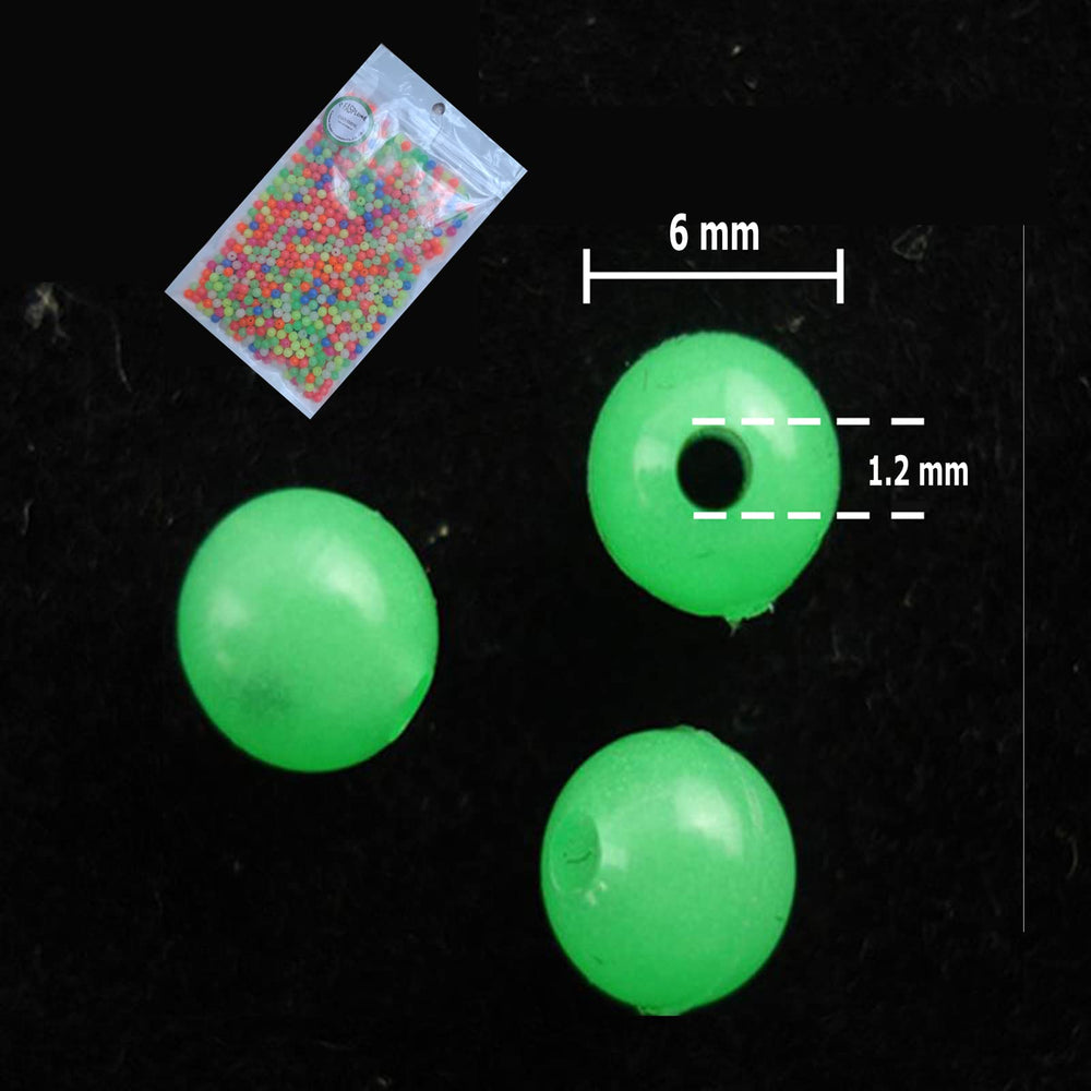 Close-up of round 6mm luminous beads showing color variety