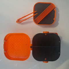 Worm gripper accessory included in the bait box