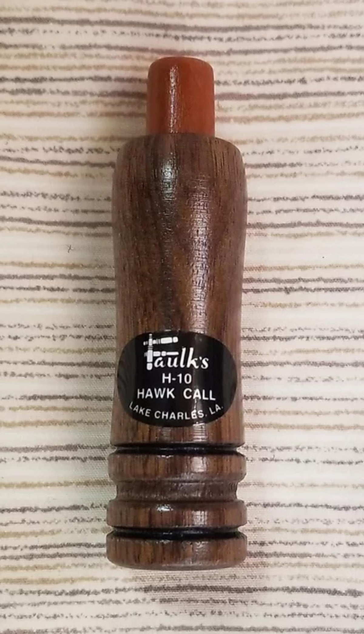 Faulk's Hawk Call H-10 in brown with walnut barrel and cherry tip for hawk and crow calls.