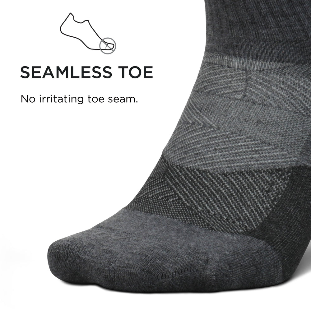 Feetures Trail Max Cushion mini quarter sock with 2-inch cuff for ankle protection.