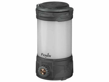 Fenix CL26R Pro lantern in grey camo lighting a campsite at night