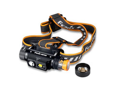 Fenix HM70R side-angle view shows wide beam for campsite tasks.