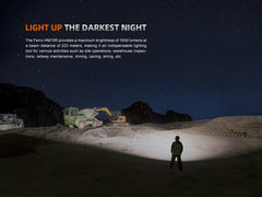 Fenix HM75R spotlight beam reaches 243 yards for precise outdoor tasks.