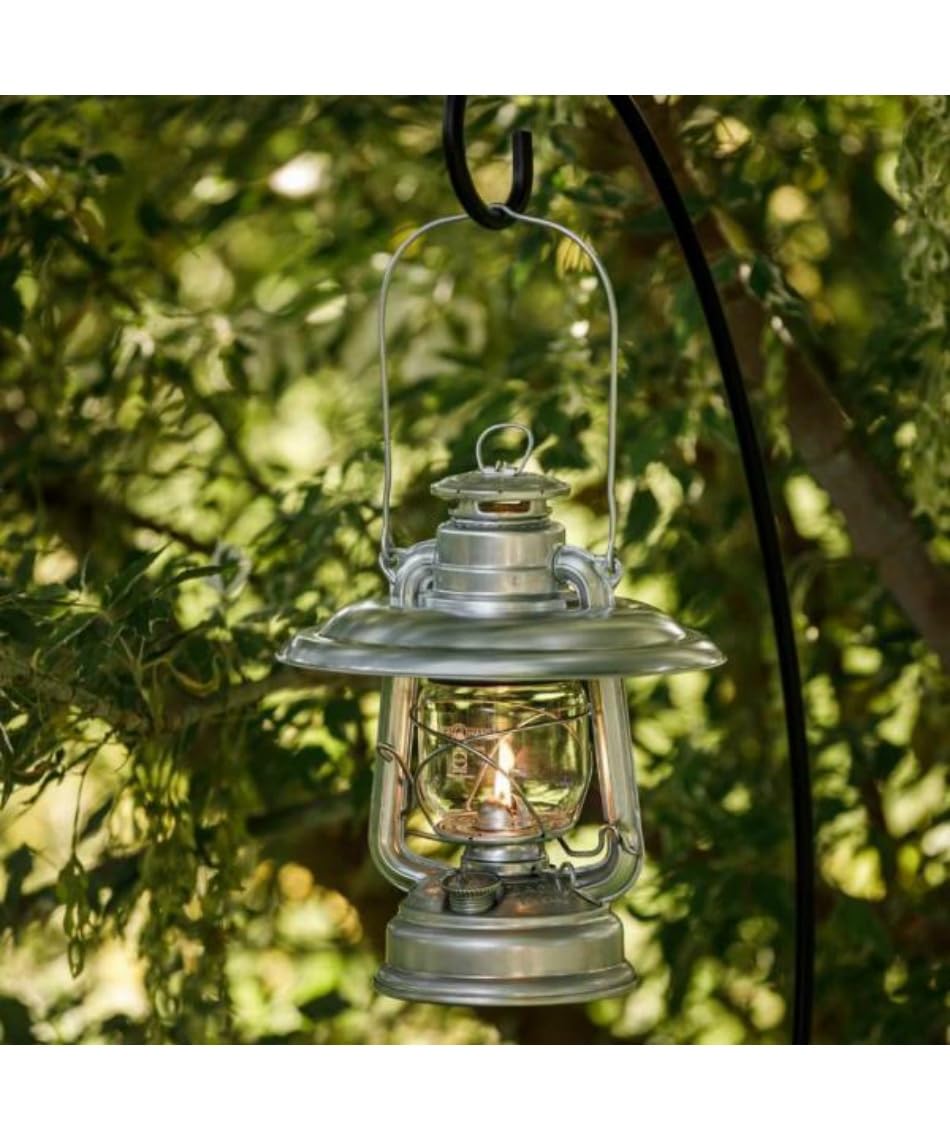 Feuerhand 13919 reflector in-use on campsite table for ambient warmth.