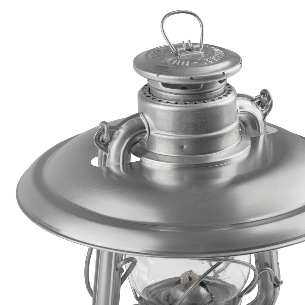Feuerhand glass-protection umbrella shields the lantern glass from rain and dirt.