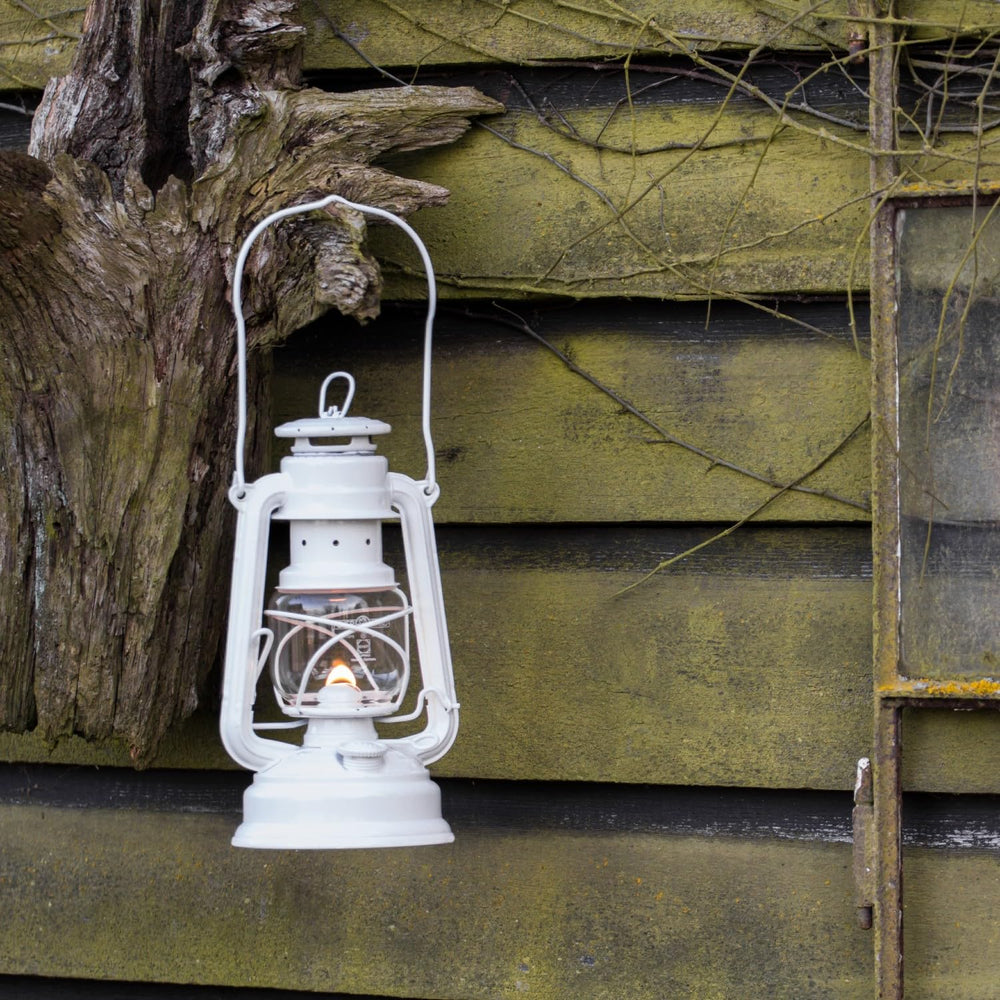 Feuerhand lantern on a patio with a ready-to-enjoy glow.