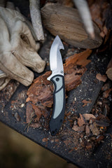 Ambidextrous thumb stud and finger flip assist on knife.