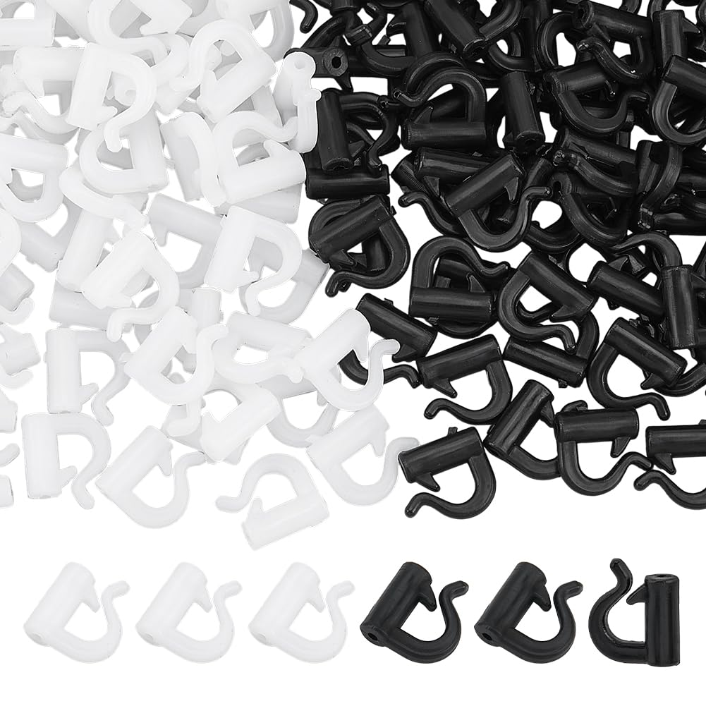 FINGERINSPIRE quick-change spinner clevis in black and white for rapid rigging.