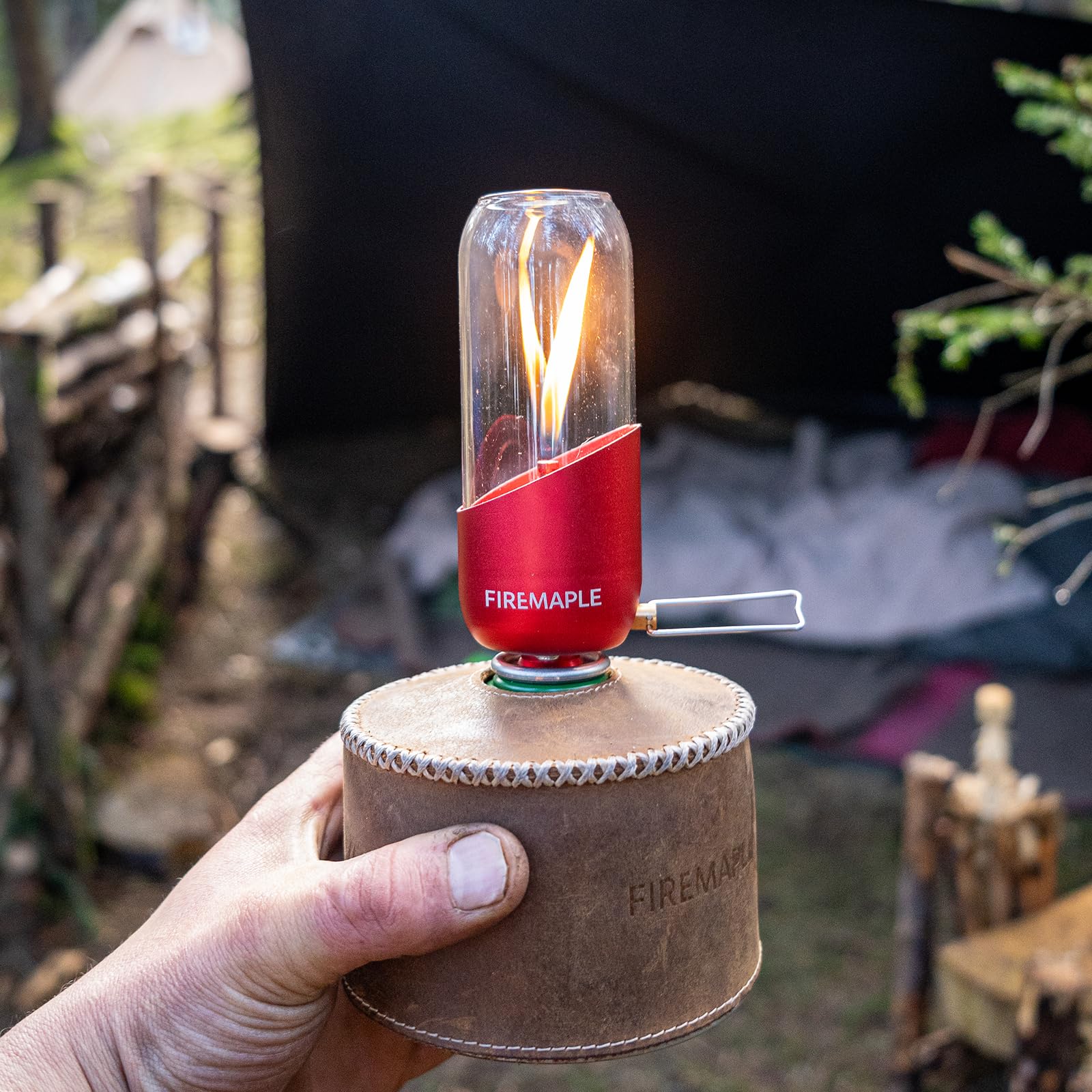 Fire-Maple orange camping lantern adapter compatibility for larger propane bottles.