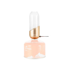 Fire-Maple orange camping lantern glass globe emits warm glow for outdoor ambiance.