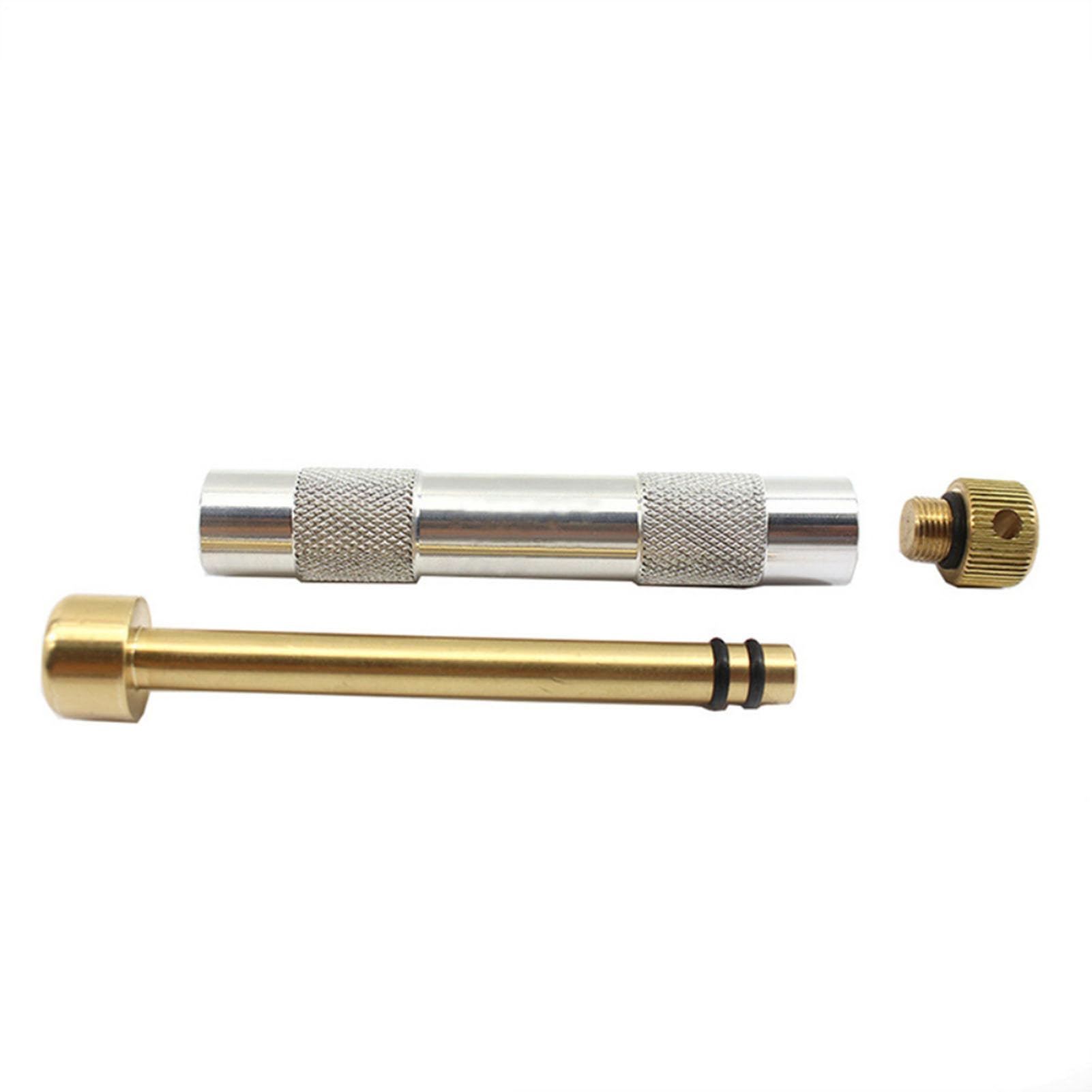Fire Starter Tube compression core demonstrates air-focused ignition for outdoor use.