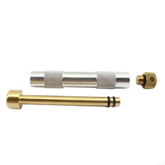 Fire Starter Tube compression core demonstrates air-focused ignition for outdoor use.