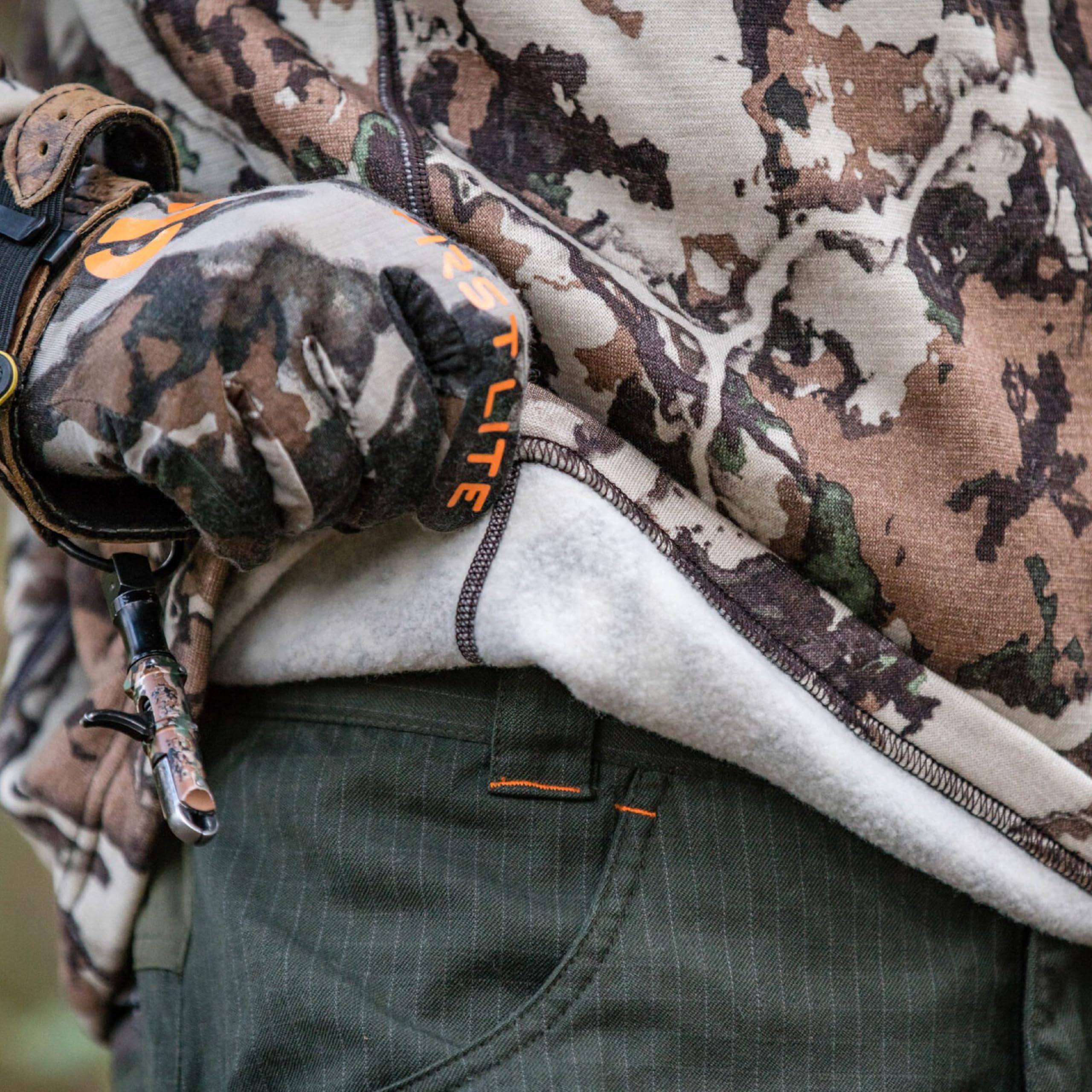 First Lite Furnace Quarter Zip high-collar design for added neck protection.