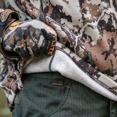 First Lite Furnace Quarter Zip high-collar design for added neck protection.