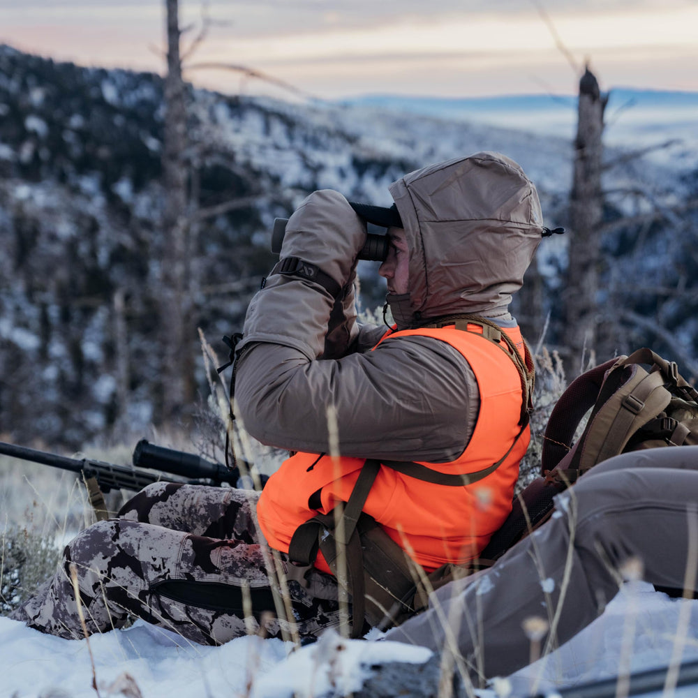 First Lite Omen Over Mitt insulated construction keeps hands warm during long glassing sessions.