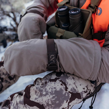 First Lite Omen Over Mitt jacket-sleeve coverage provides complete hand protection in cold weather.
