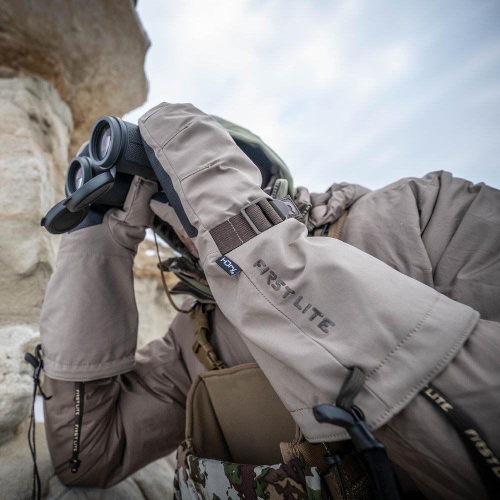 First Lite Omen Over Mitt worn over liner gloves demonstrates rapid adaptation to changing temperatures.