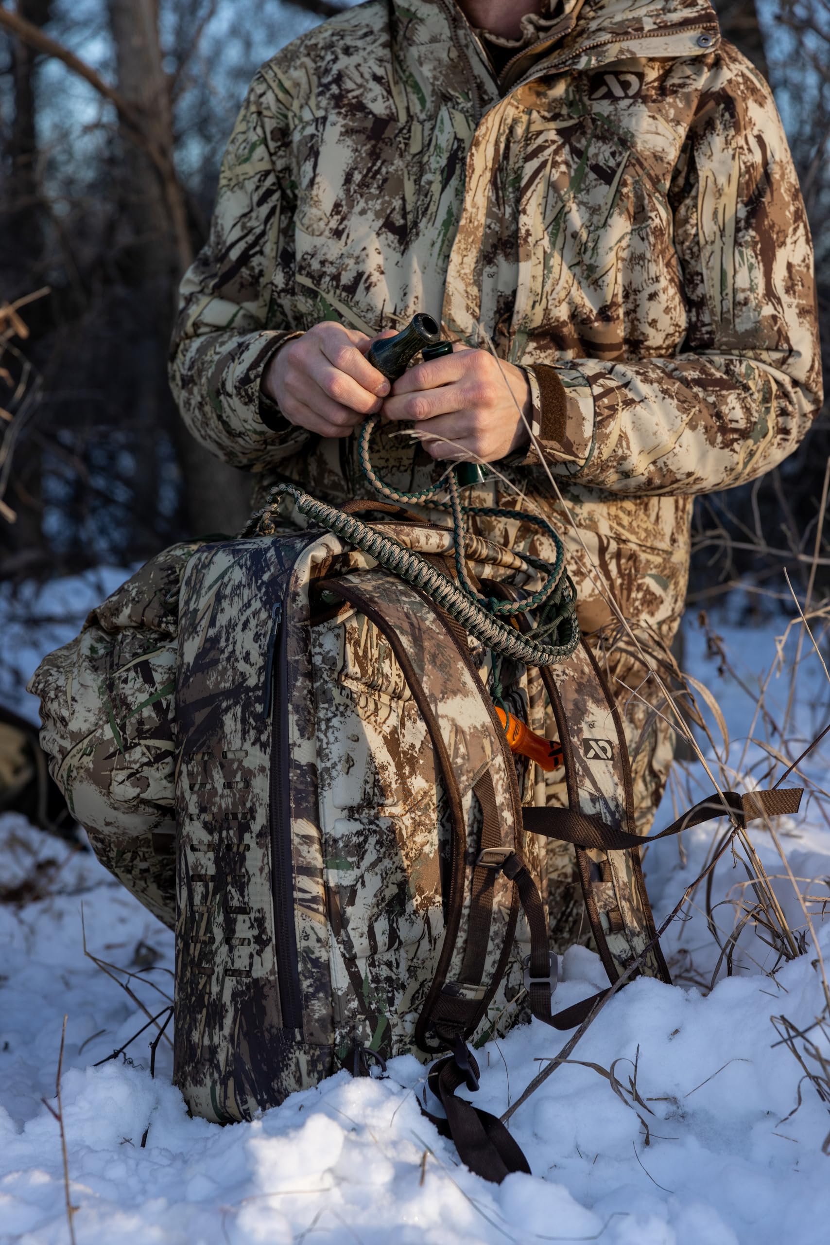 First Lite Refuge Bib Pant oversized dump pockets for shells and gear