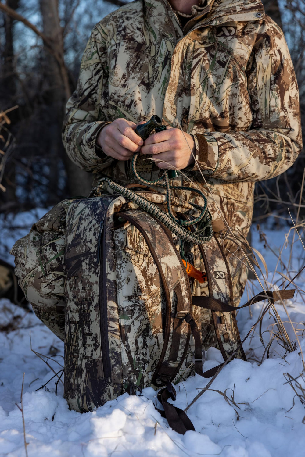 First Lite Refuge Bib Pant oversized dump pockets for shells and gear