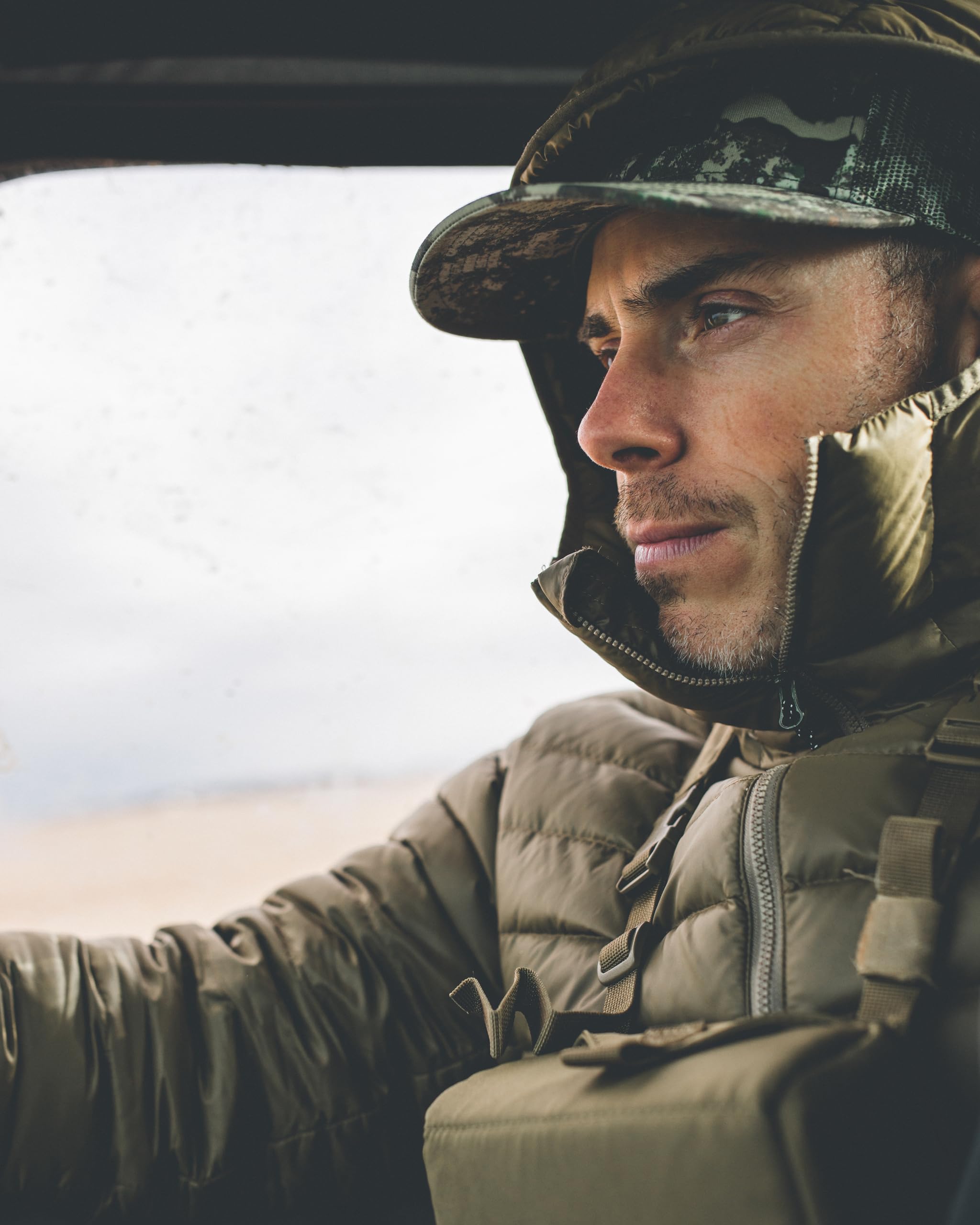 First Lite Specter camouflage detail enhances concealment in natural settings.