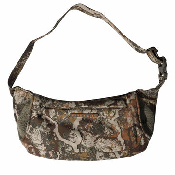 First Lite Thermic Muff, front view in camo, showcases windproof warmth for hunts.