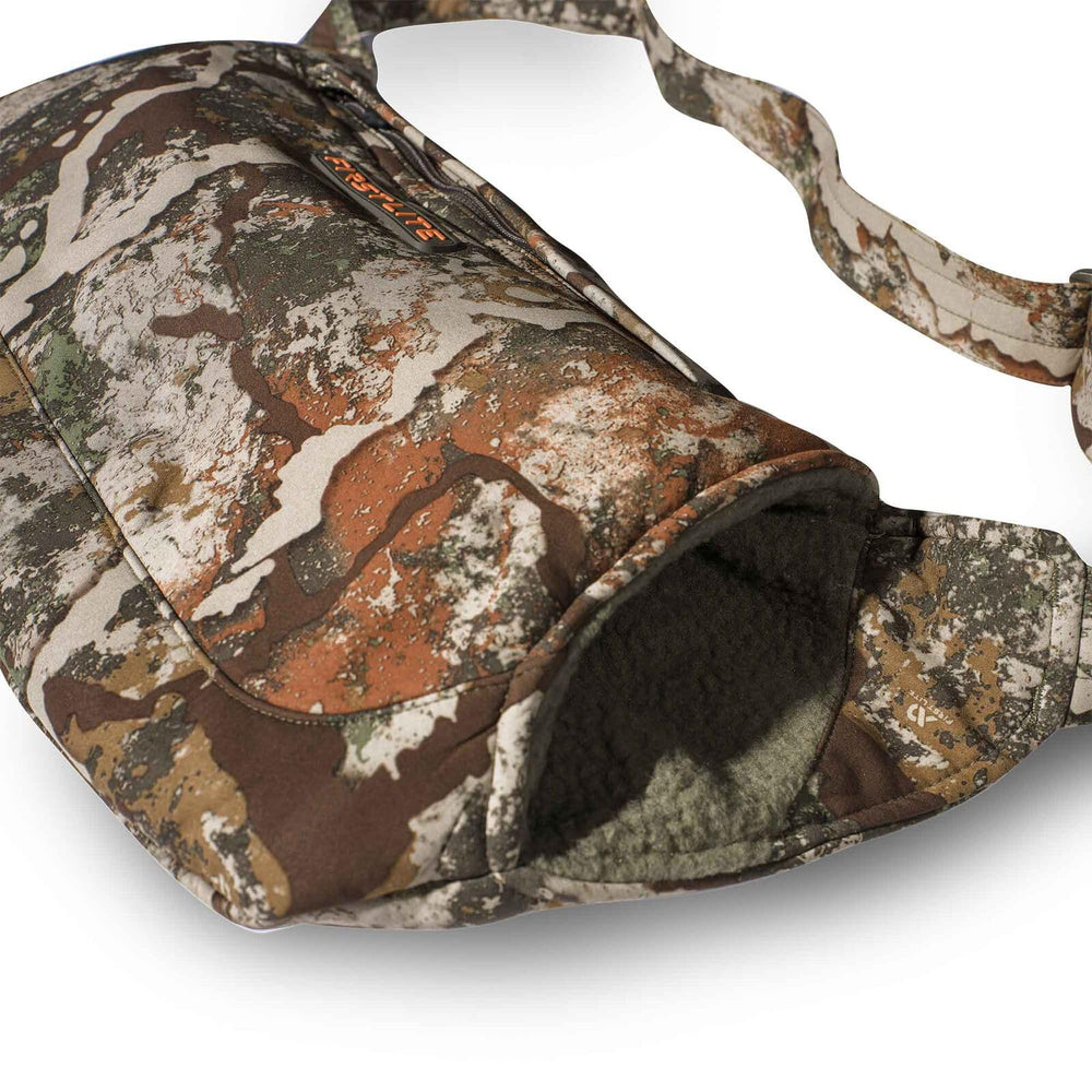 First Lite Thermic Muff, side view, windproof exterior protects against cold treestands.