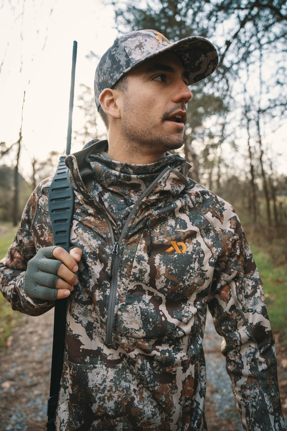 First Lite Trucker Hat outdoor setup for hunting and casual wear.