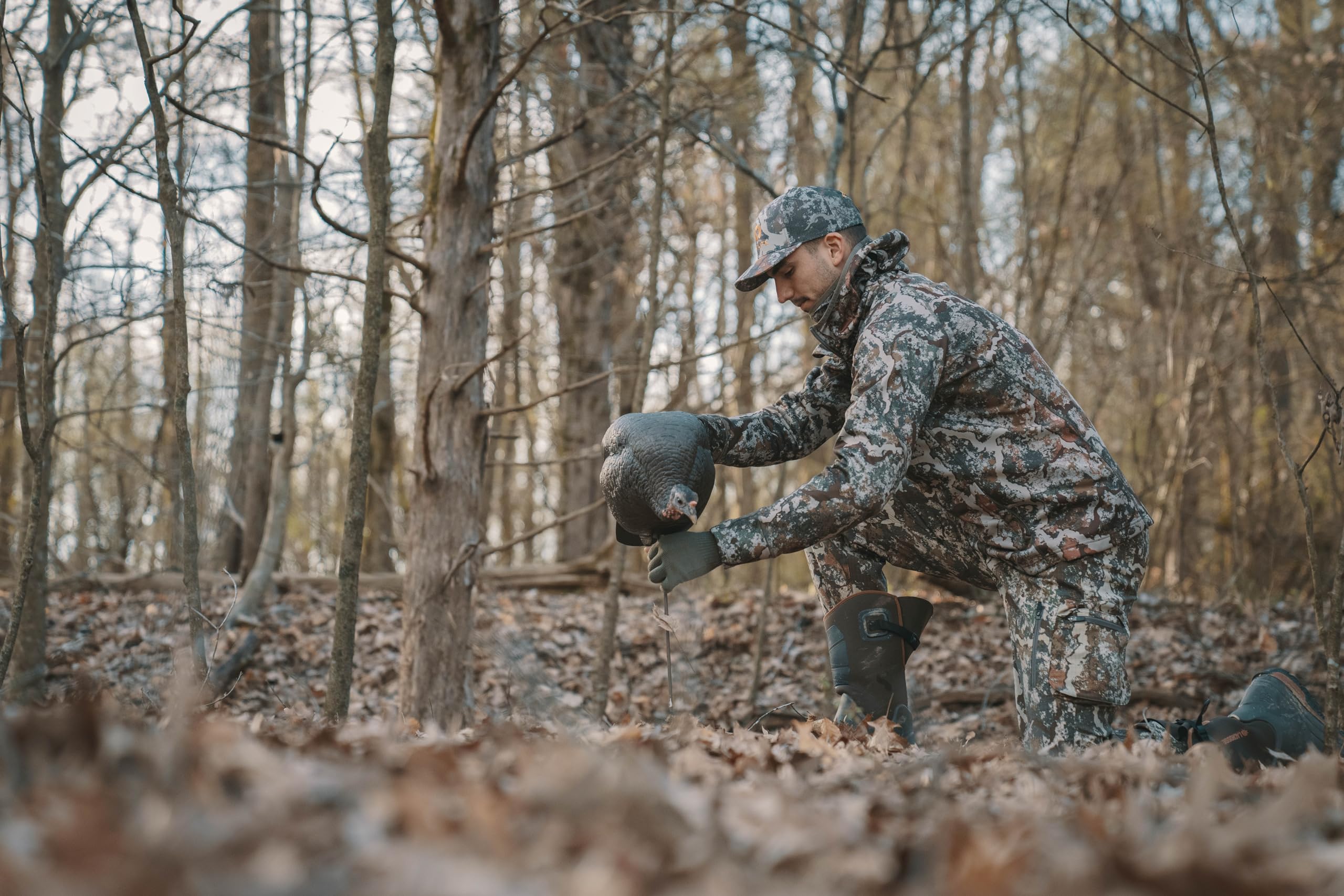First Lite Trucker Hat use in nature for fishing or hiking.