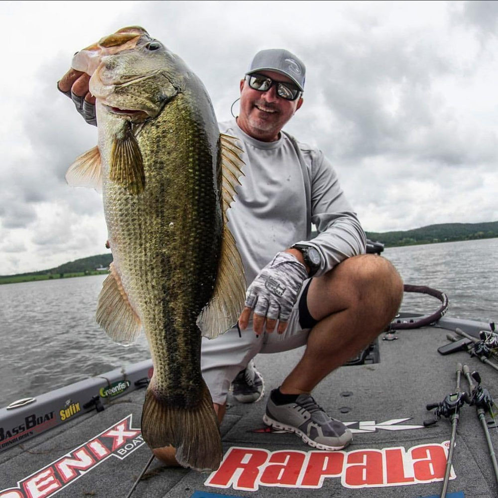 Fish Monkey FM18 glove worn during coastal trolling for steady tool handling.