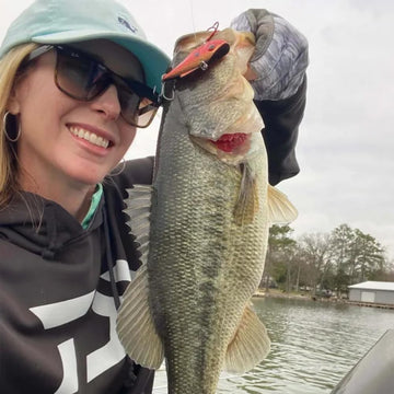 Fish Monkey SPF 50+ non-slip grip keeps tools secure when casting and reeling.