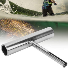 Compact design shown next to diving gear for portability