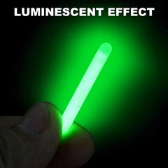 Glow sticks attached to fishing bobber for night use