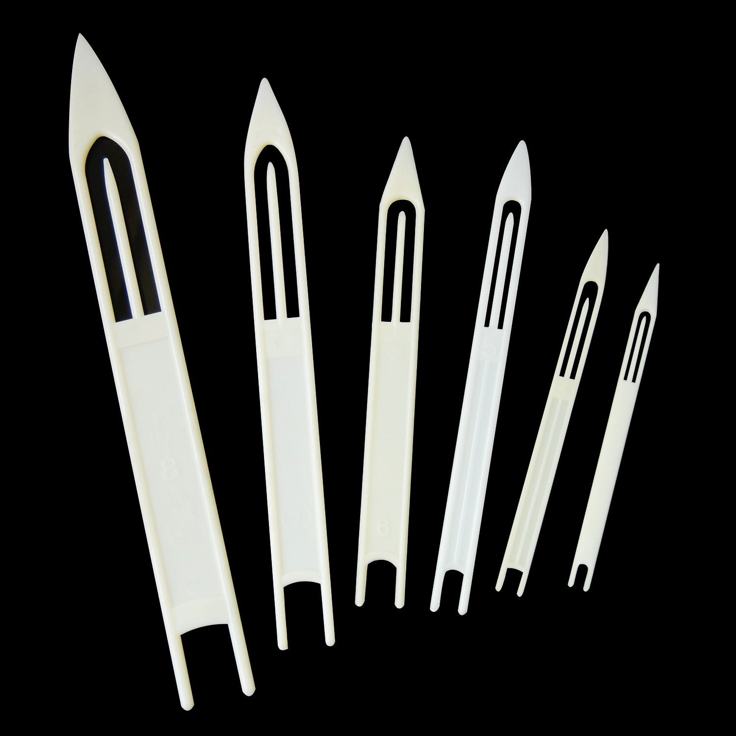 Kit layout with seven needles and storage case