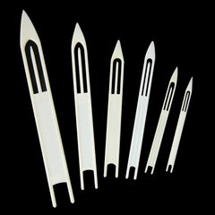 Kit layout with seven needles and storage case