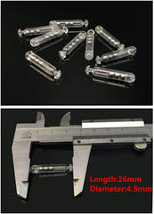 Close-up of hard plastic rattles and metal ball insert