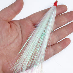 Multiple teaser rigs displayed with jigs and soft plastics