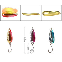 Spoon lure reflecting light underwater to attract trout, char and perch