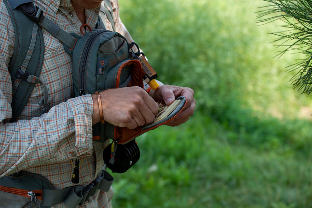 Side view showing exterior quick-access pocket