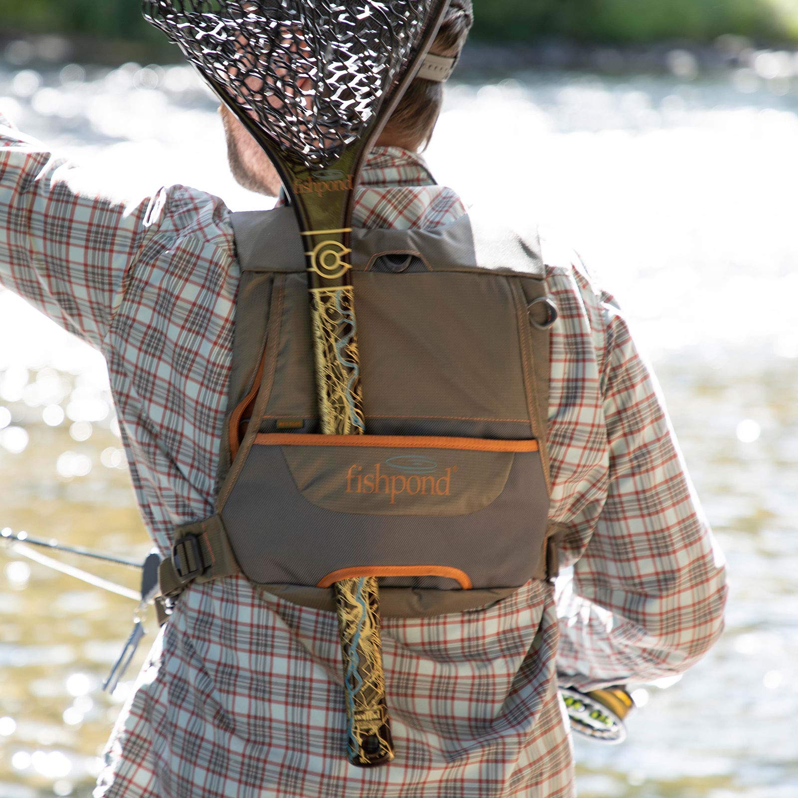 fishpond Cross-Current Chest Pack front zip pocket provides quick access to essential tools